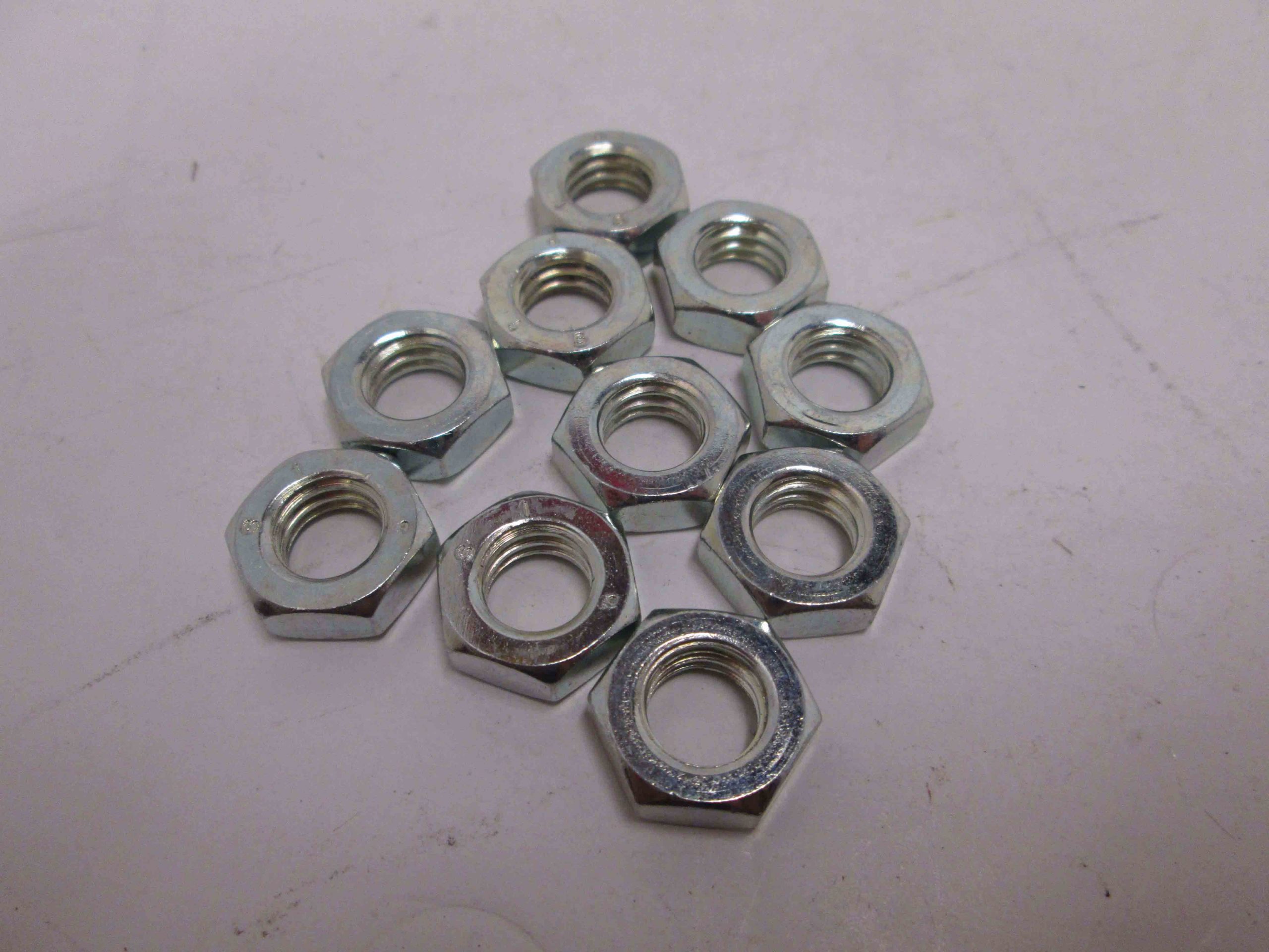 NUT - 7/16-14 HEX JAM NUT L.H. THR PK OF 10